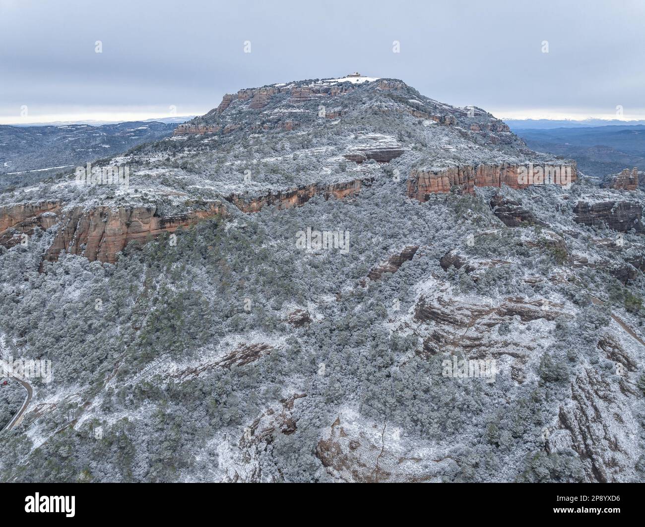 Aerial view of the snow-capped Mola mountain after the snowfall on 02-27-2023 (Matadepera, Vallès Occidental, Barcelona, Catalonia, Spain) Stock Photo