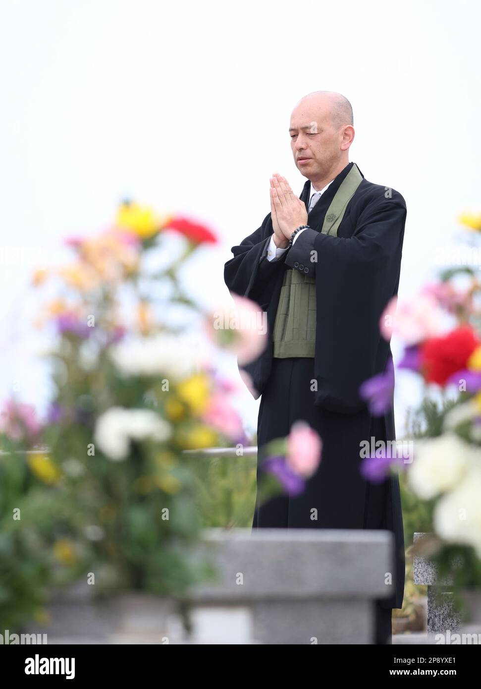 Recite Mark Buddhist monks recite a sutra for the victims of the Tohoku Earthquake ...