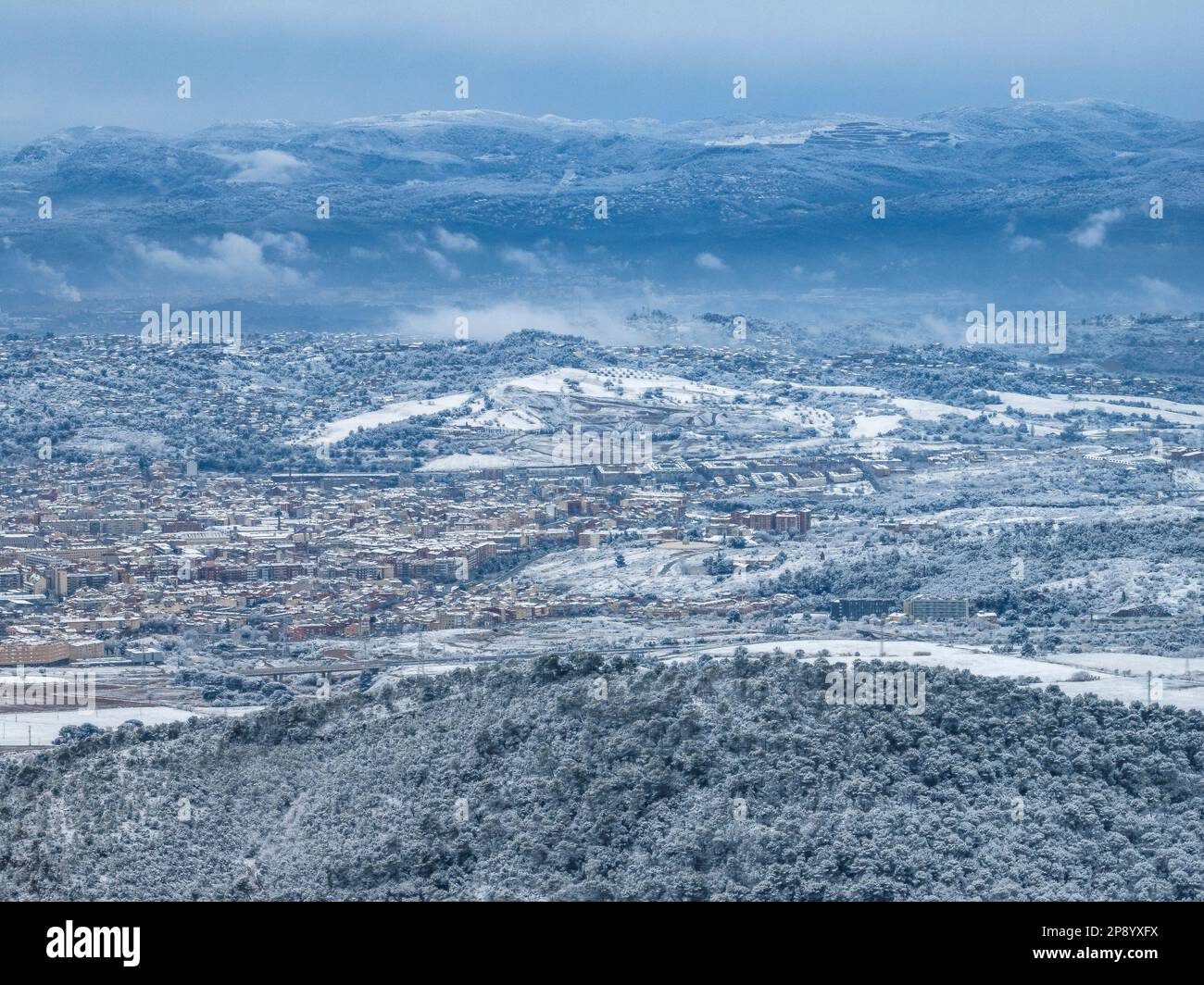 Aerial view of the snowy city of Terrassa after the snowfall of 02-27-2023 (Vallès Occidental, Barcelona, Catalonia, Spain) Stock Photo