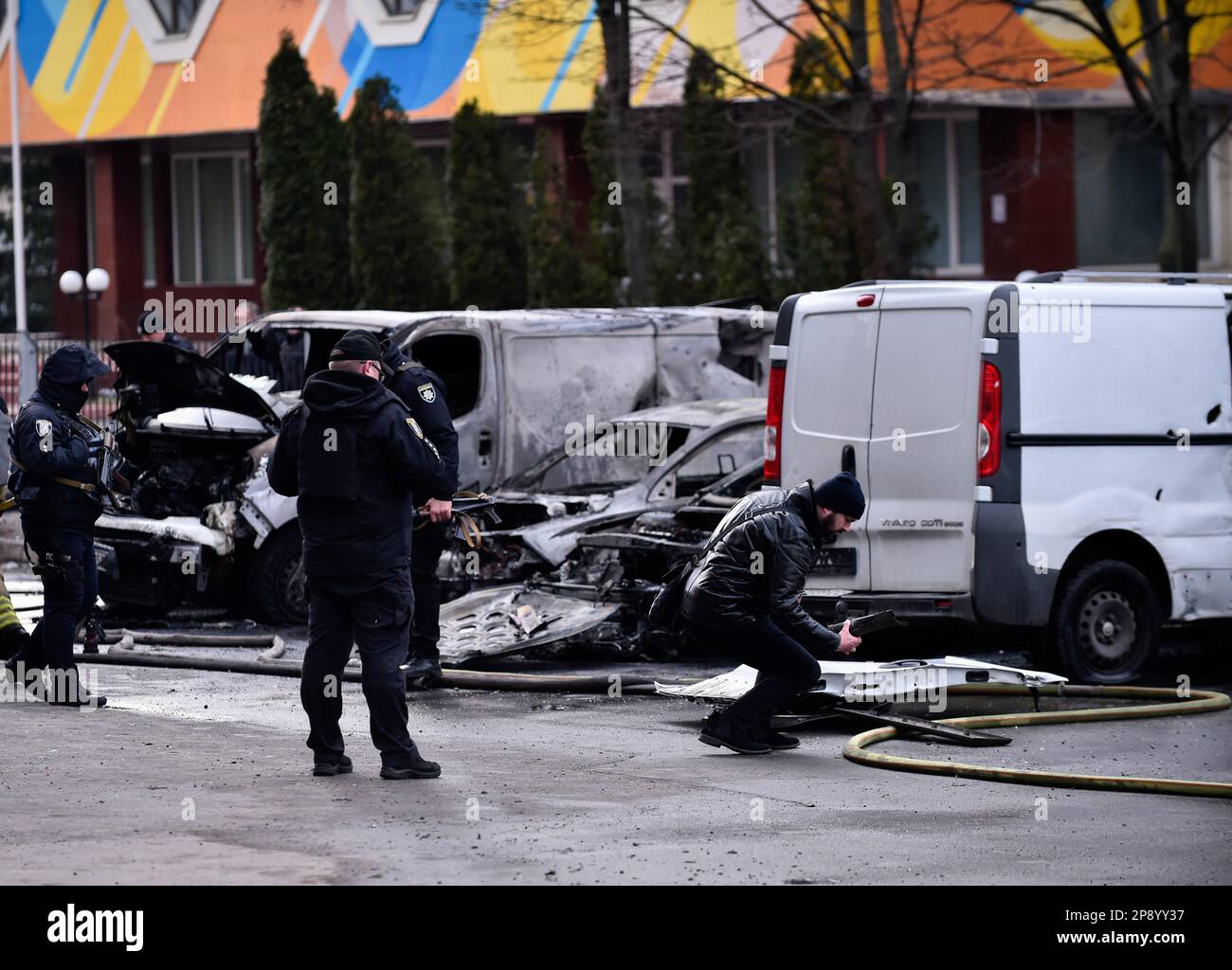 Kyiv, Ukraine. 09th Mar, 2023. The police conducts an investigation near burned-out cars that were damaged as a result of rocket fire by the Russian army in Kyiv. Tonight, Russia launched a massive missile attack on Ukraine. As a result of the attack, power outages, problems with water supply and heating occurred in some regions. Credit: SOPA Images Limited/Alamy Live News Stock Photo