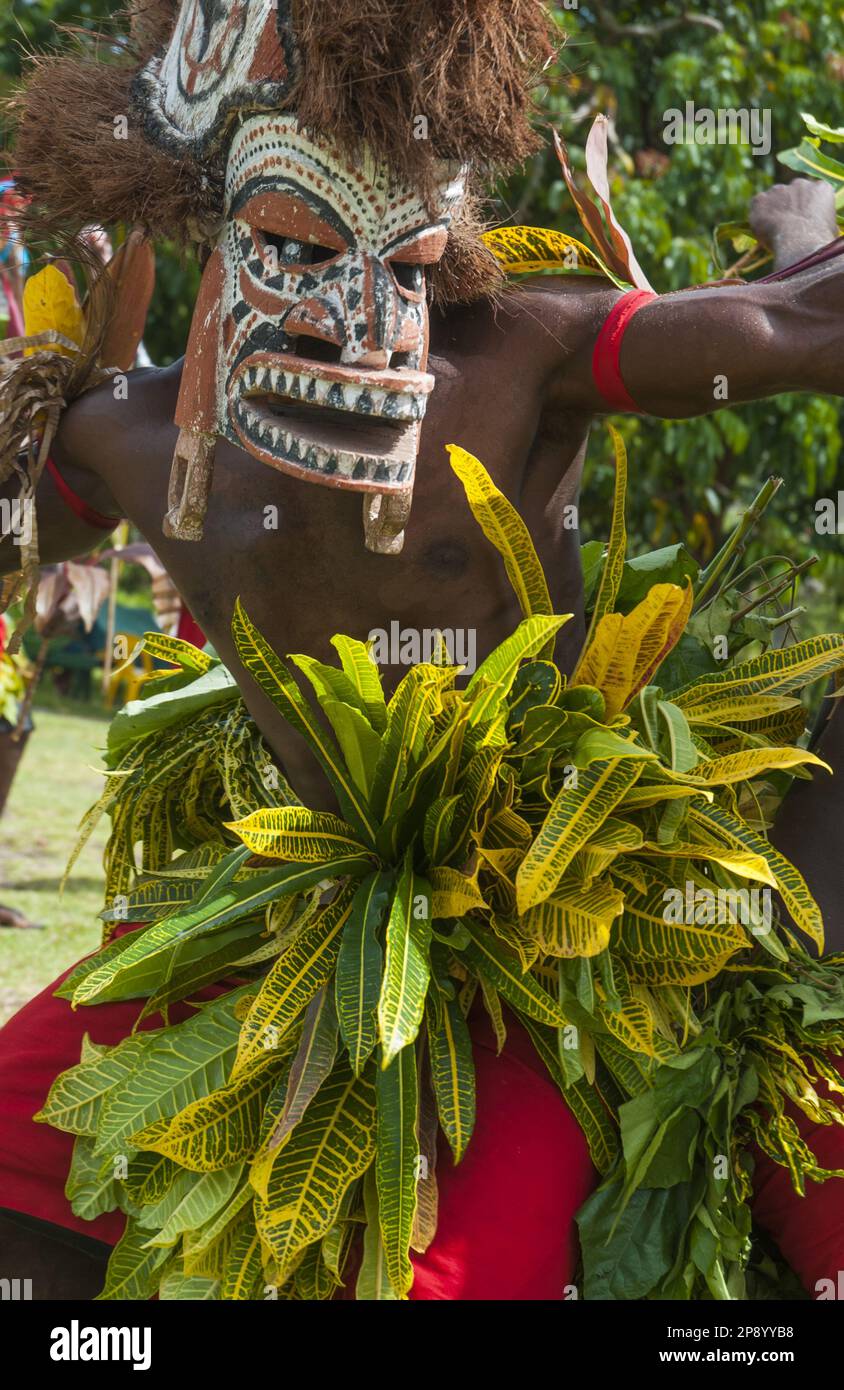 Masked dancer at Fissoa, New Ireland Province, Papua New Guinea Stock Photo