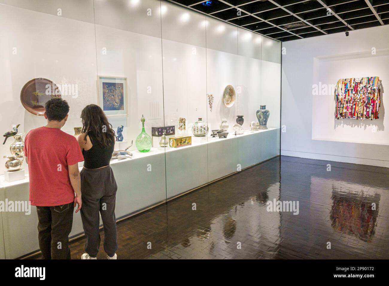 Mexico City,Museo de Arte Popular,folk art museum,looking at teen teens teenage teenager teenagers,youth culture friends adolescent,resident residents Stock Photo