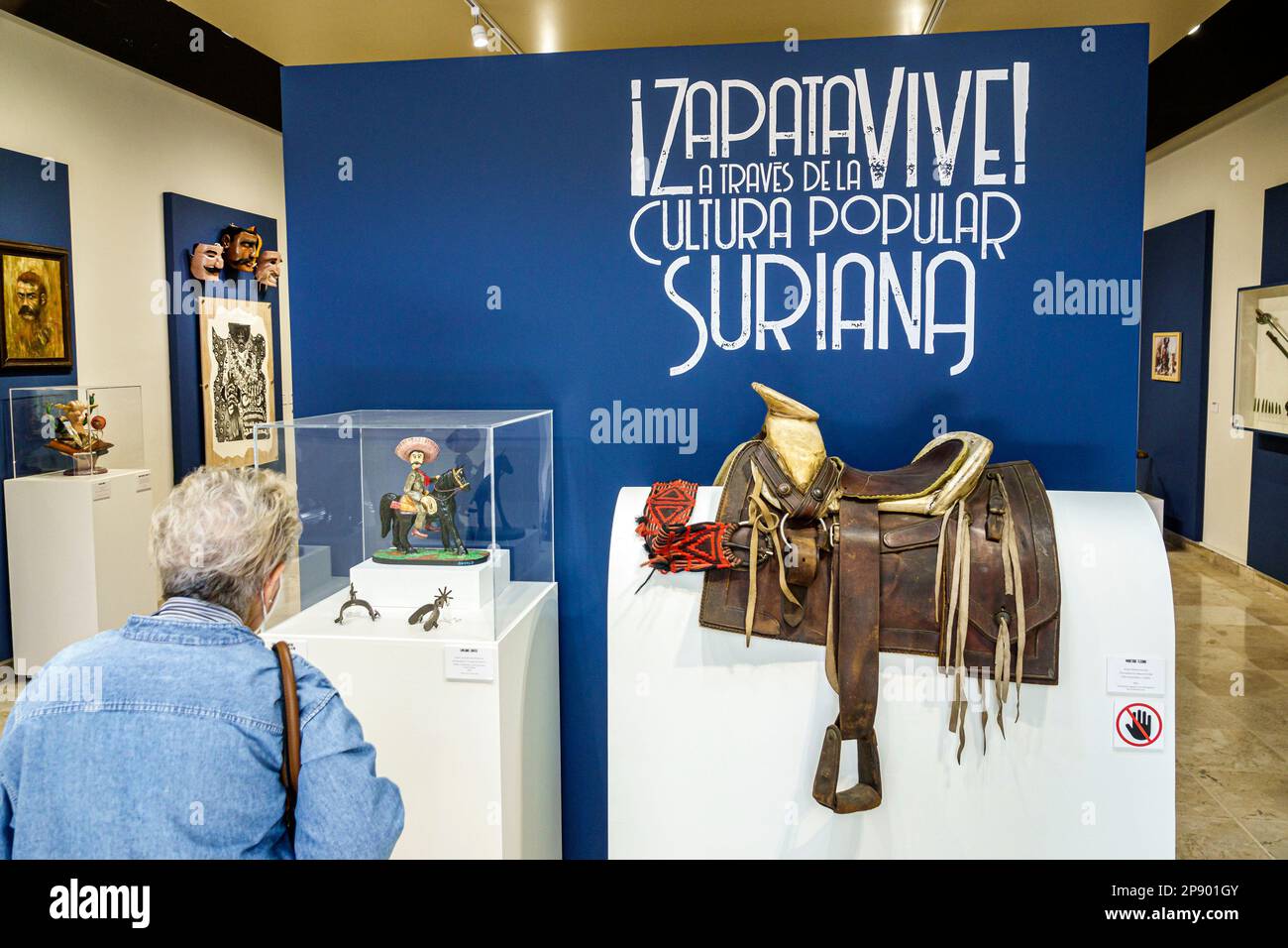 Mexico City,Coyoacan Museum of Popular Culture,Museo de Cultura Popular,Emiliano Zapata folk art,looking at woman women lady female,adult adults,resid Stock Photo