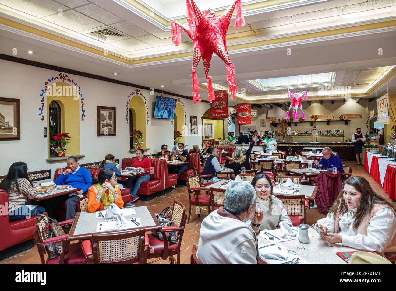 Mexico City,Sanborns hanging pinata Coyoacan,Carlos Slim-run Grupo Carso,man men male,woman women lady female,adult adults,resident residents,couple c Stock Photo