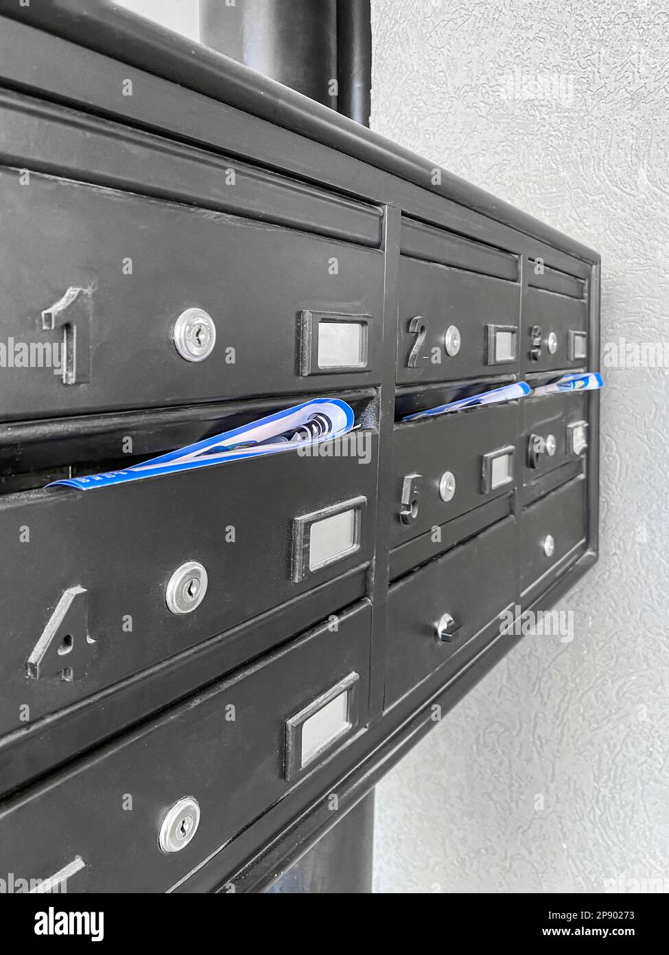 Modern mailboxes near residential building, closeup Stock Photo Alamy