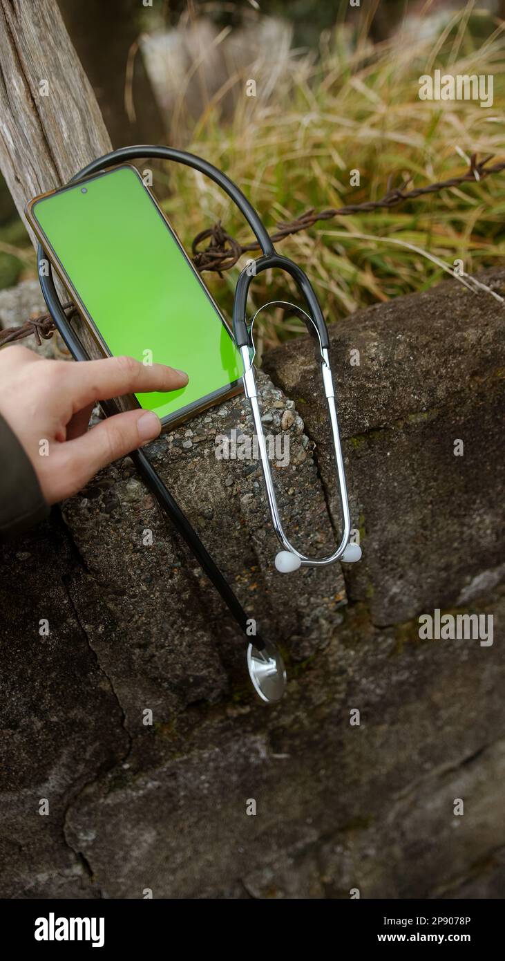 Using Digital Health Apps Hand Operating Smartphone with Stethoscope