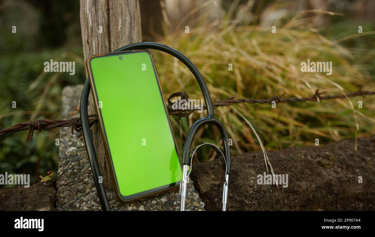 Smartphone with Green Screen and Stethoscope Wrapped Around It Concept