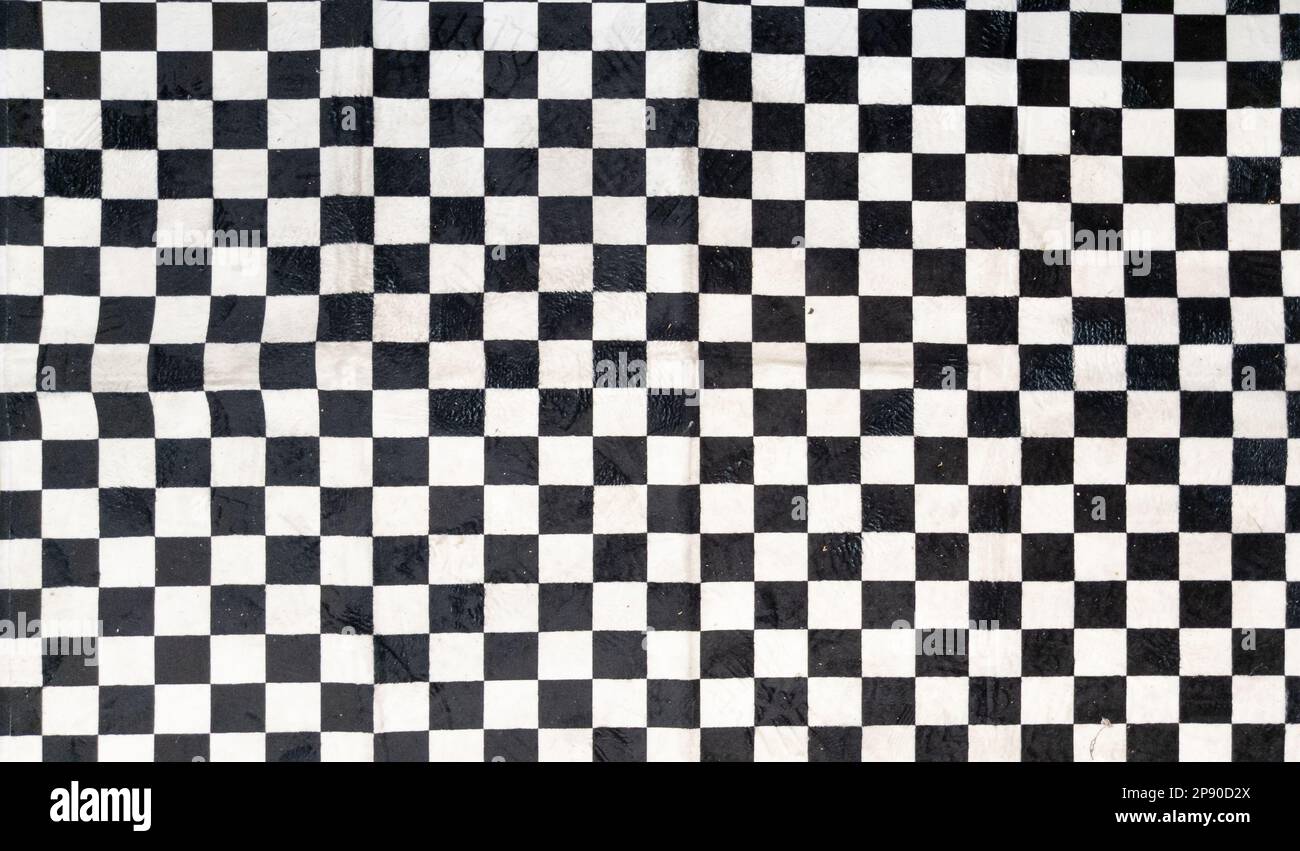 black and white checkered carpet fabric background in car and