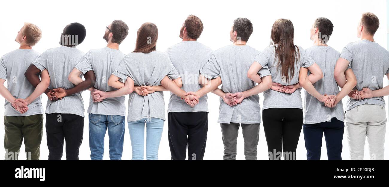 rear view. a large group of motivated young people Stock Photo - Alamy