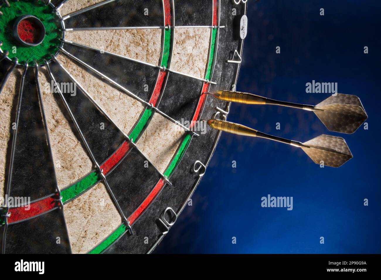 Dart board and two darts scoring a double Stock Photo Alamy
