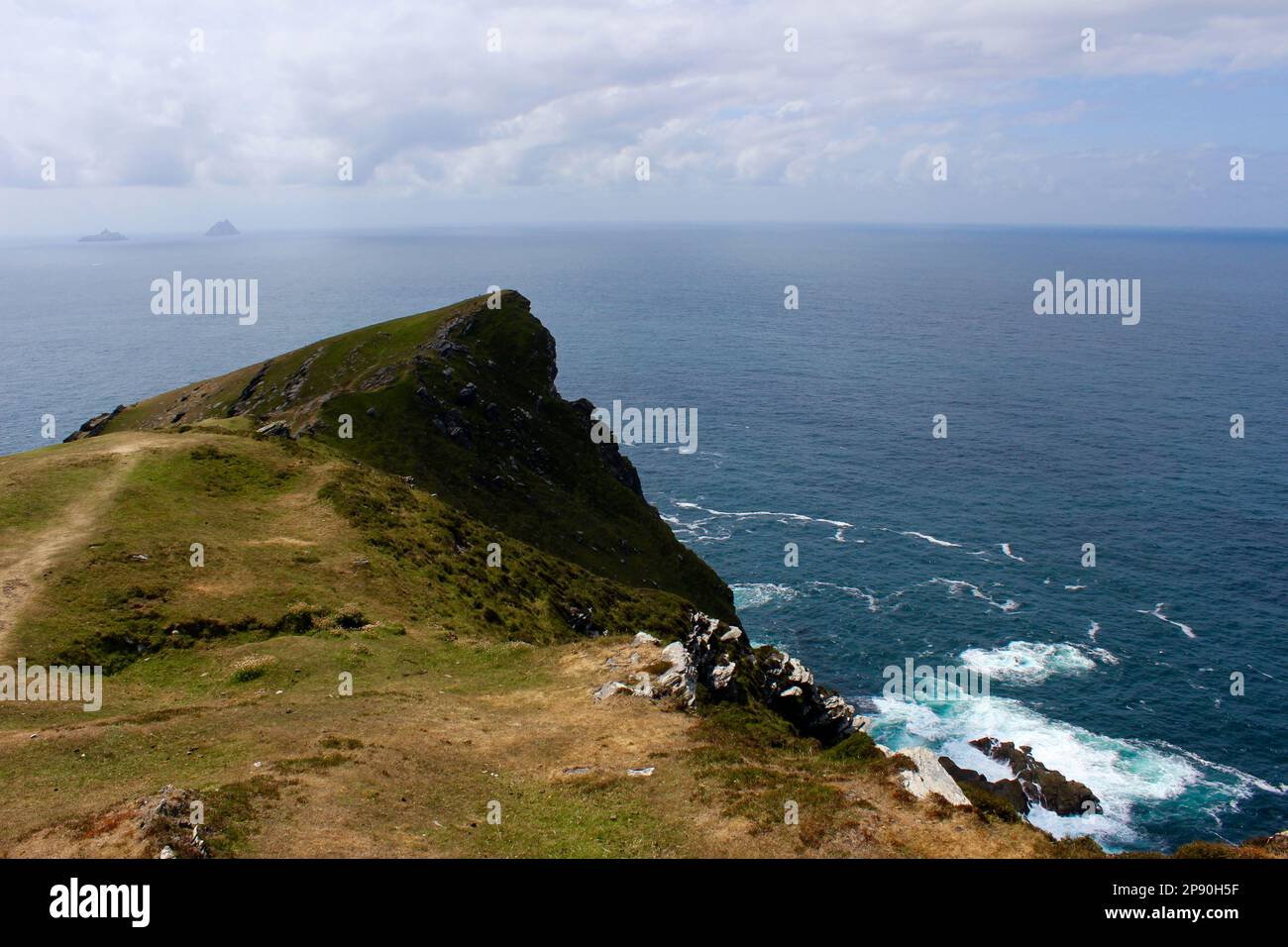 The photo was taken in the summer during a trip to Ireland, the photo represents a cliff overlooking the sea. Stock Photo