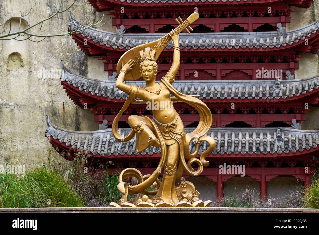 Statue of the Flying Goddess at the Wugao Grottoes in Dunhuang, China Stock Photo