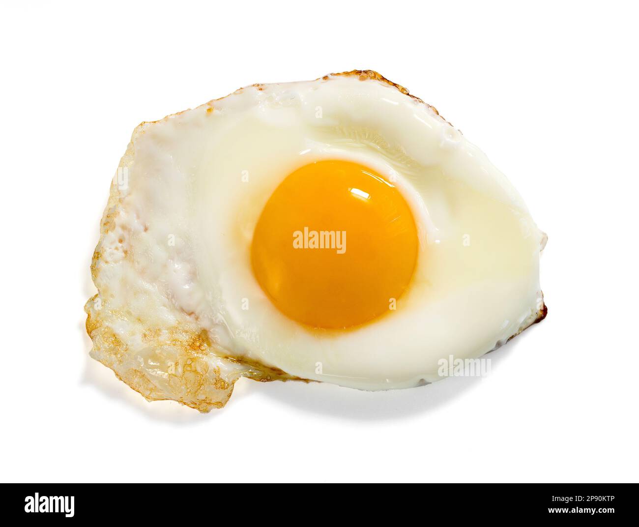 Top view of delicious homemade fried egg with orange yolk placed on white background Stock Photo