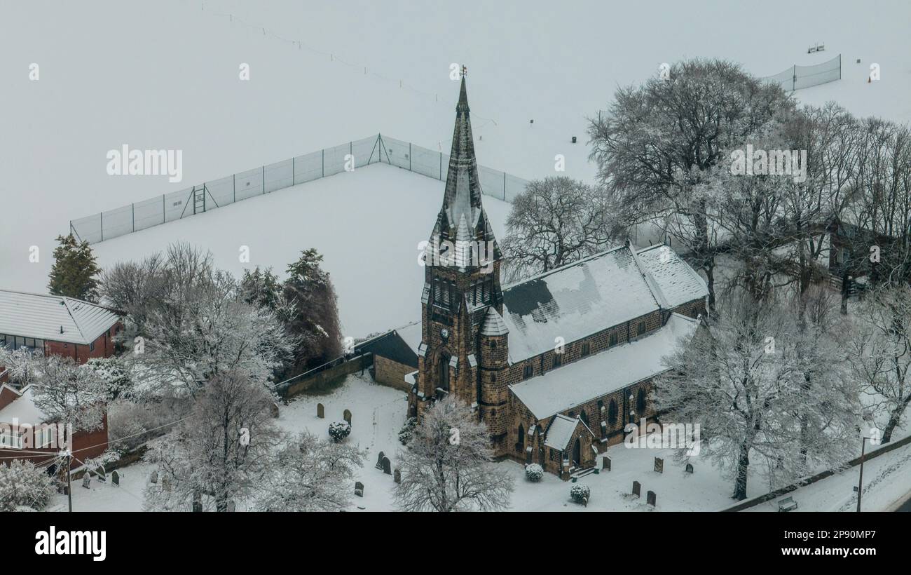 An aerial view of St Pauls church in the village of Monk Bretton in Barnsley as Yellow warning of snow is enforce in the Yorkshire area; Monk Bretton, Barnsley,  South Yorkshire, United Kingdom, 10th March 2023  (Photo by Mark Cosgrove/News Images) Stock Photo