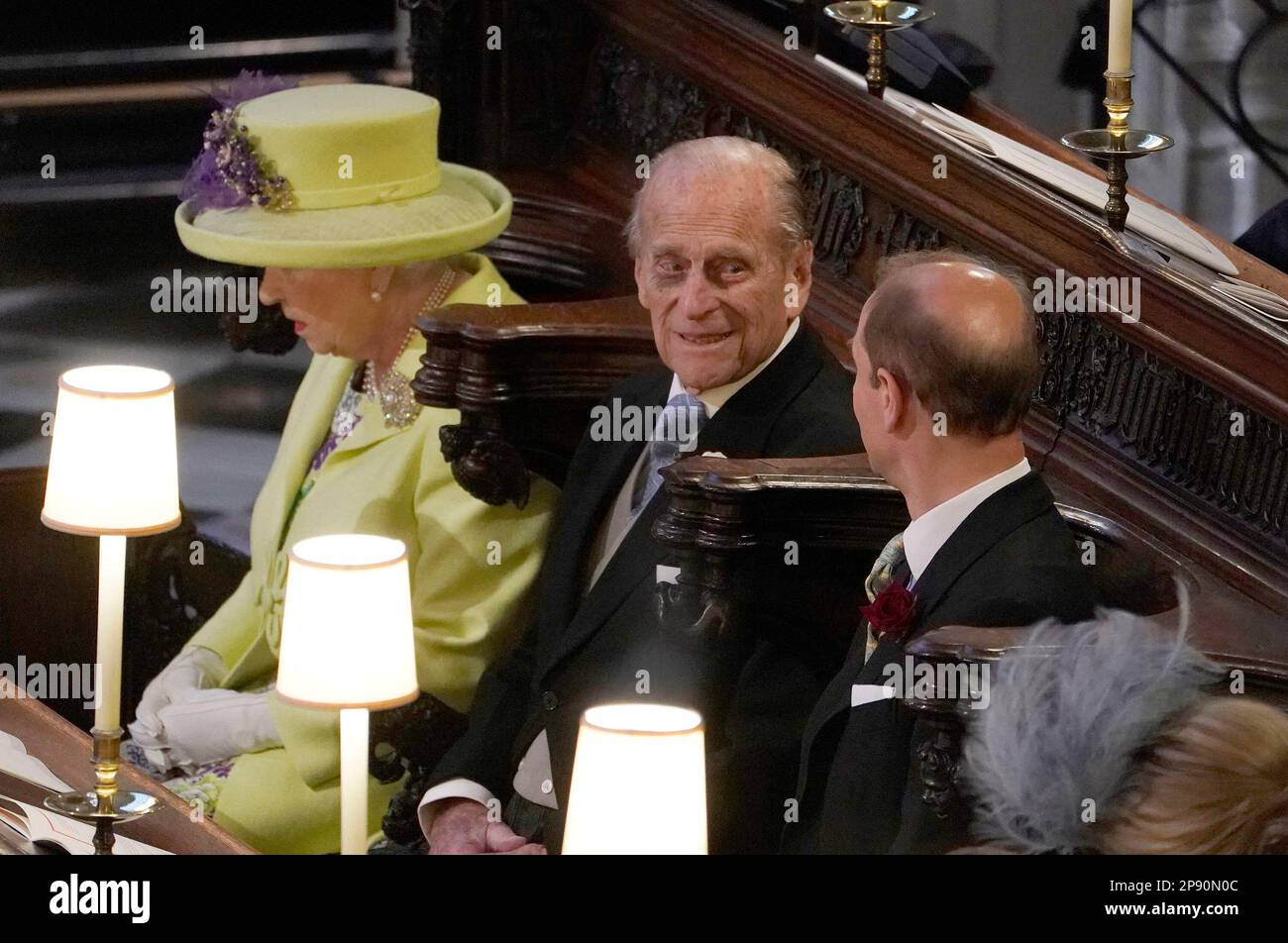 File photo dated 19/05/18 of (left to right) the late Queen Elizabeth II, the late Duke of Edinburgh and the Earl of Wessex, during the wedding of Prince Harry and Meghan Markle at St George's Chapel at Windsor Castle. King Charles III has handed his late father's title the Duke of Edinburgh to his brother Prince Edward, honouring the late Queen and Philip's wishes. Charles conferred the title on the former Earl of Wessex in celebration of his 59th birthday. Issue date: Friday March 10, 2023. Stock Photo