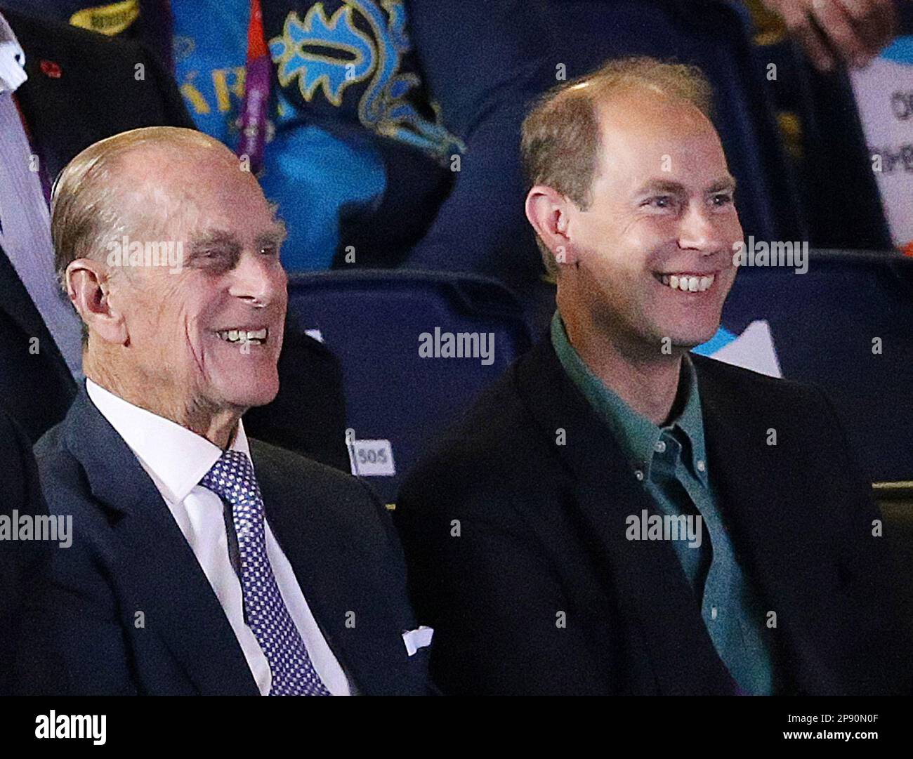File photo dated 02/08/12 of the late Duke of Edinburgh (left) and the Earl of Wessex, watching Great Britain's Anthony Ogogo in his fight against Ukraine's Levgen Khytrov in the Men's Middleweight (75kg) fight at the Excel Arena, London, during day 5 of the London Olympic Games. King Charles III has handed his late father's title the Duke of Edinburgh to his brother Prince Edward, honouring the late Queen and Philip's wishes. Charles conferred the title on the former Earl of Wessex in celebration of his 59th birthday. Issue date: Friday March 10, 2023. Stock Photo