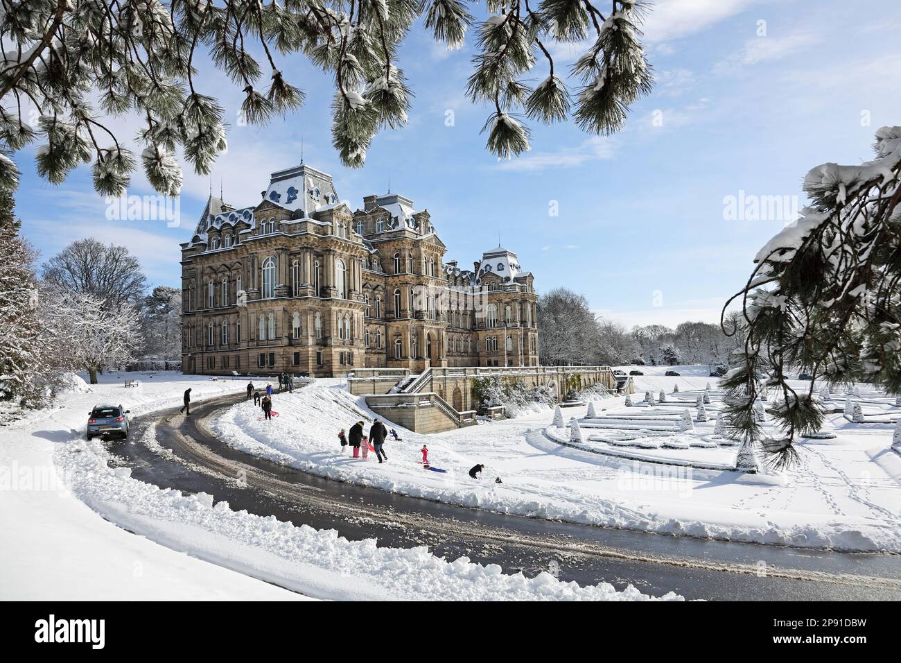 Bowes Museum, Barnard Castle, County Durham, UK. 10th March 2023. UK Weather. With many schools closed due to the weather, families enjoy some fun in the snow in the grounds of the Bowes Museum in Barnard Castle this morning. Credit: David Forster/Alamy Live News Stock Photo