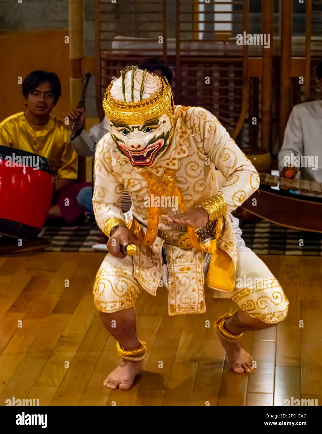 A traditional Khmer dancer in Cambodia performs on a river cruise ship moored in the capital Phnom Penh. Stock Photo