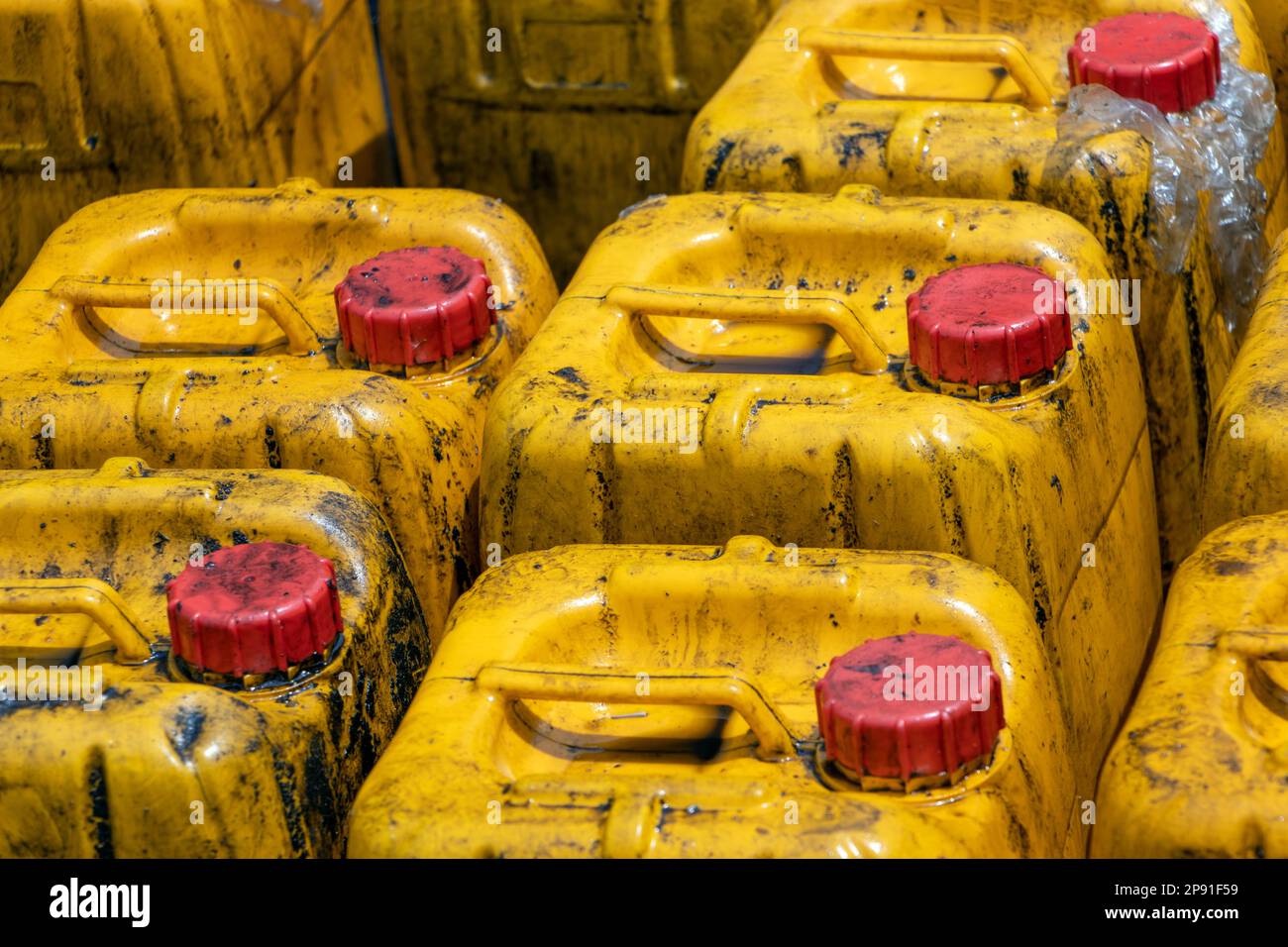 Stock of dirty plastic jerry cans Stock Photo Alamy