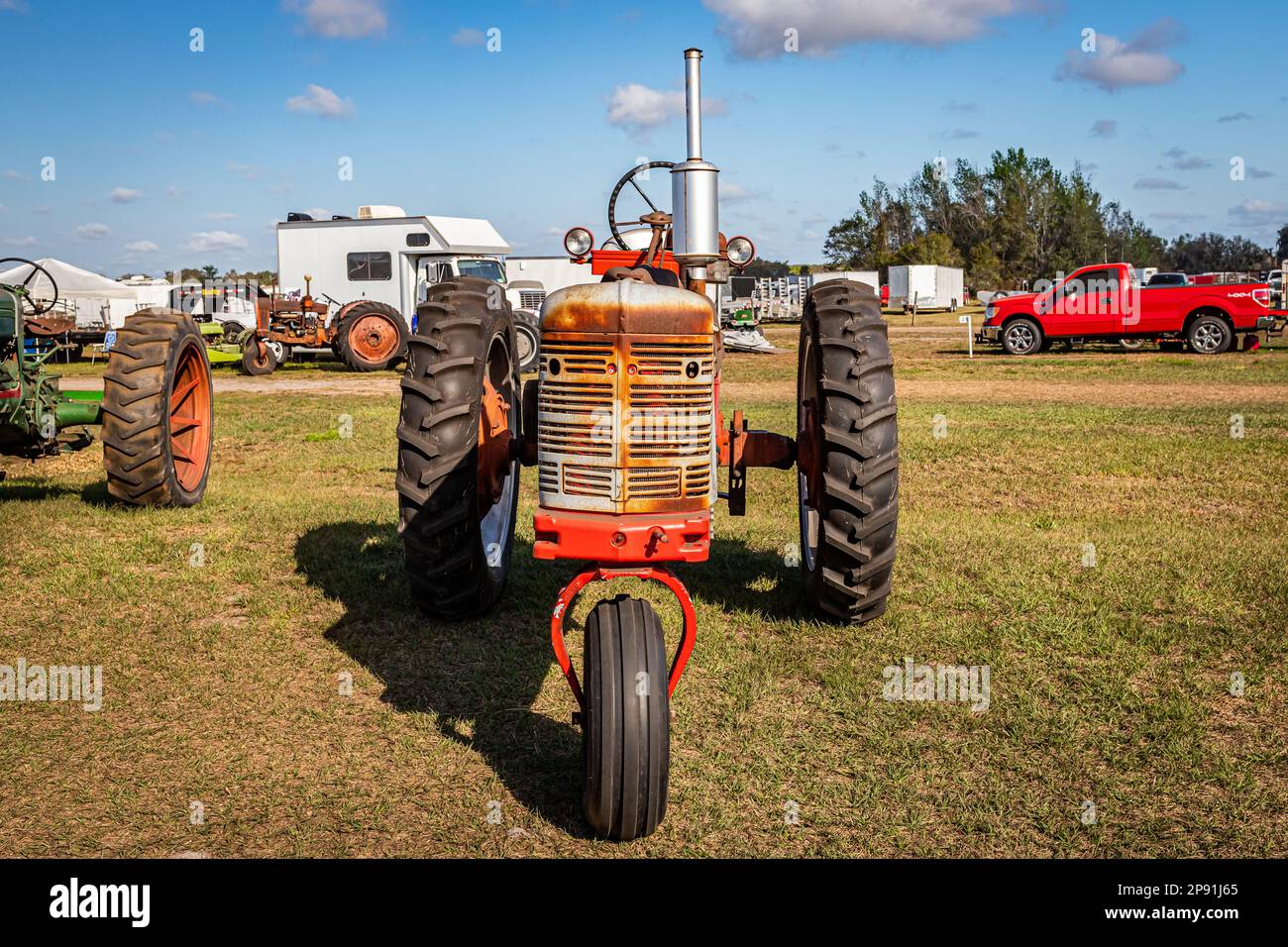 Fort Meade, FL - February 26, 2022: High perspective front view of a 1954 International Harvester McCormick Farmall Super H Tractor at a local tractor Stock Photo