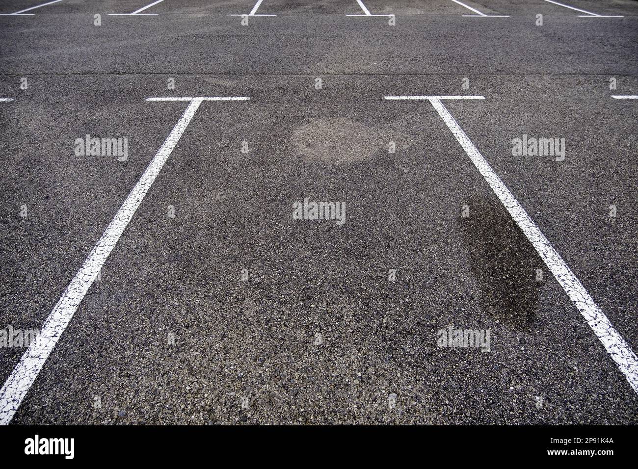 Detail of parking lines in a public parking lot, road signs Stock Photo