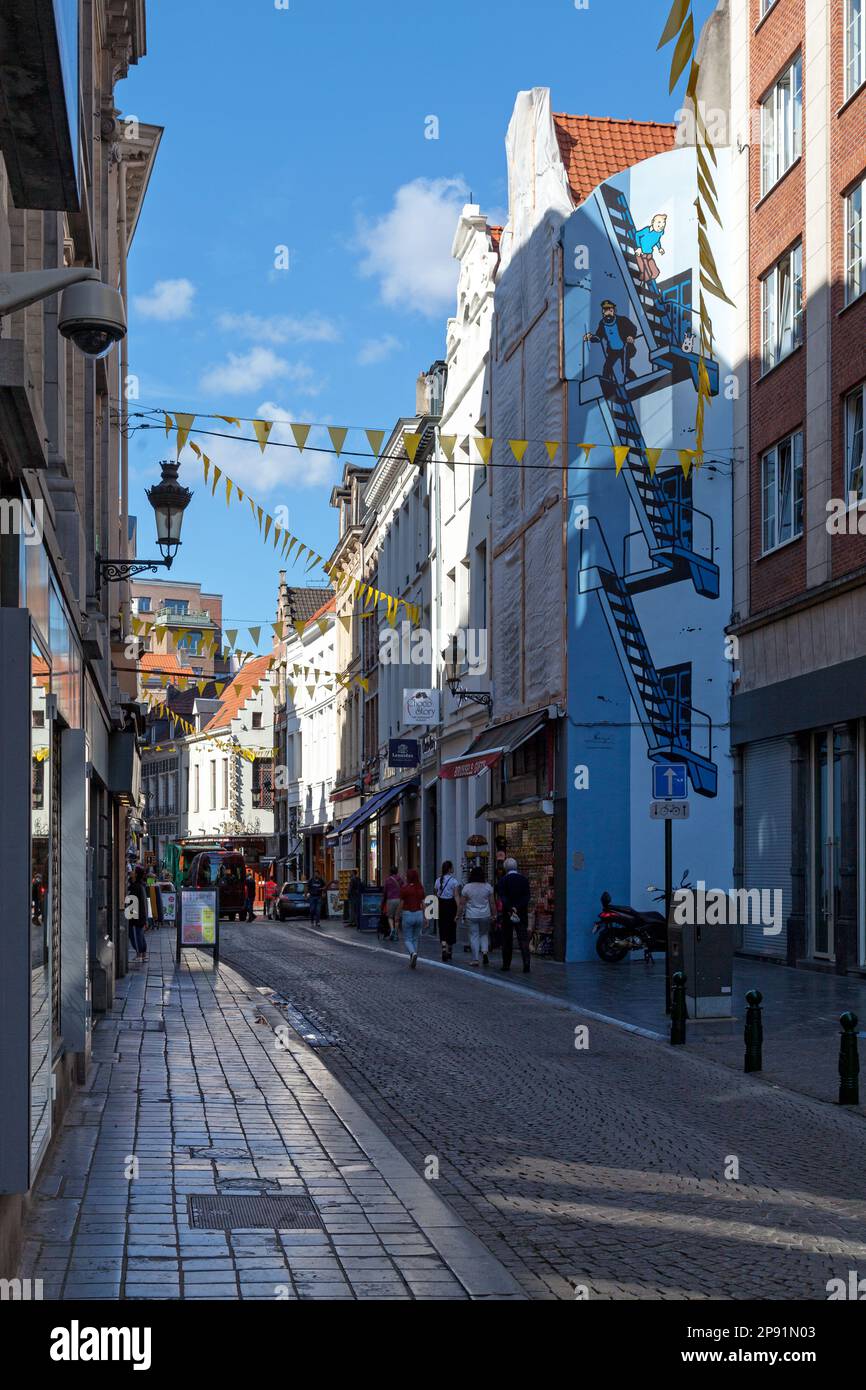 Brussels, Belgium - July 02 2019: The Tintin Wall is located 'Rue de l'Étuve'. The wall illustrates Tintin and Captain Haddock going down the stairs. Stock Photo