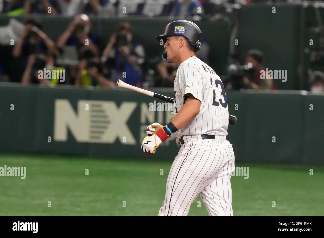 Japan's Lars Nootbaar reacts after hitting a single during the
