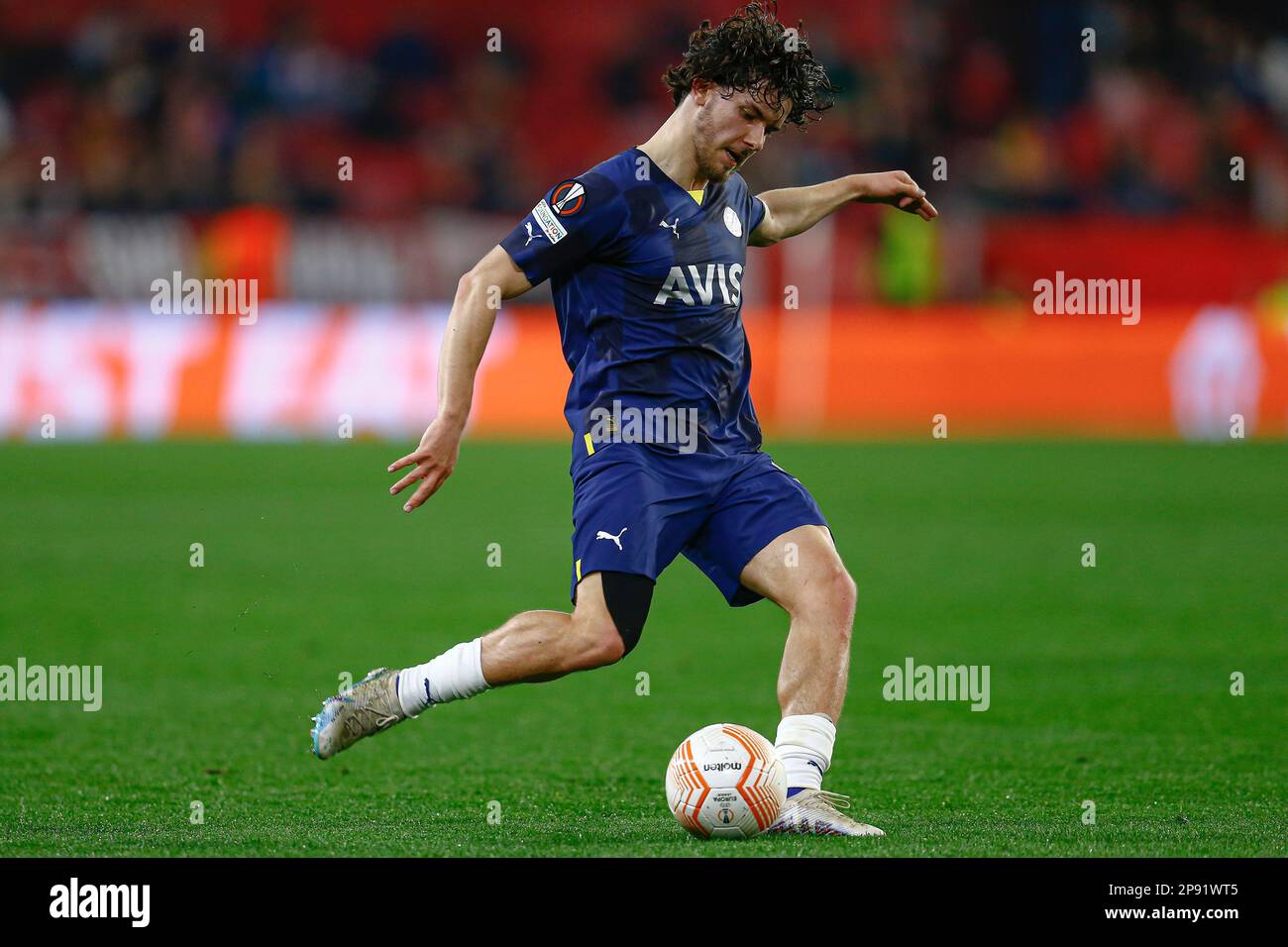 Ferdi Kadioglu of Fenerbahce  during the UEFA Europa League match, Round of 16, 1st leg, between Sevilla FC v Fenerbahce Spor Kulubu played at Ramon Sanchez Pizjuan Stadium on March 9, 2023 in Sevilla, Spain. (Photo by Antonio Pozo / PRESSIN) Stock Photo