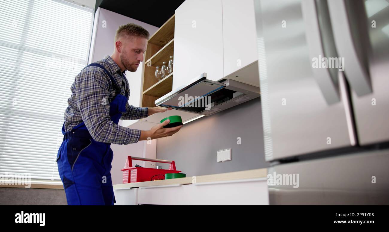 Stove Exhaust Fan Extractor Filter Maintenance And Change Stock Photo