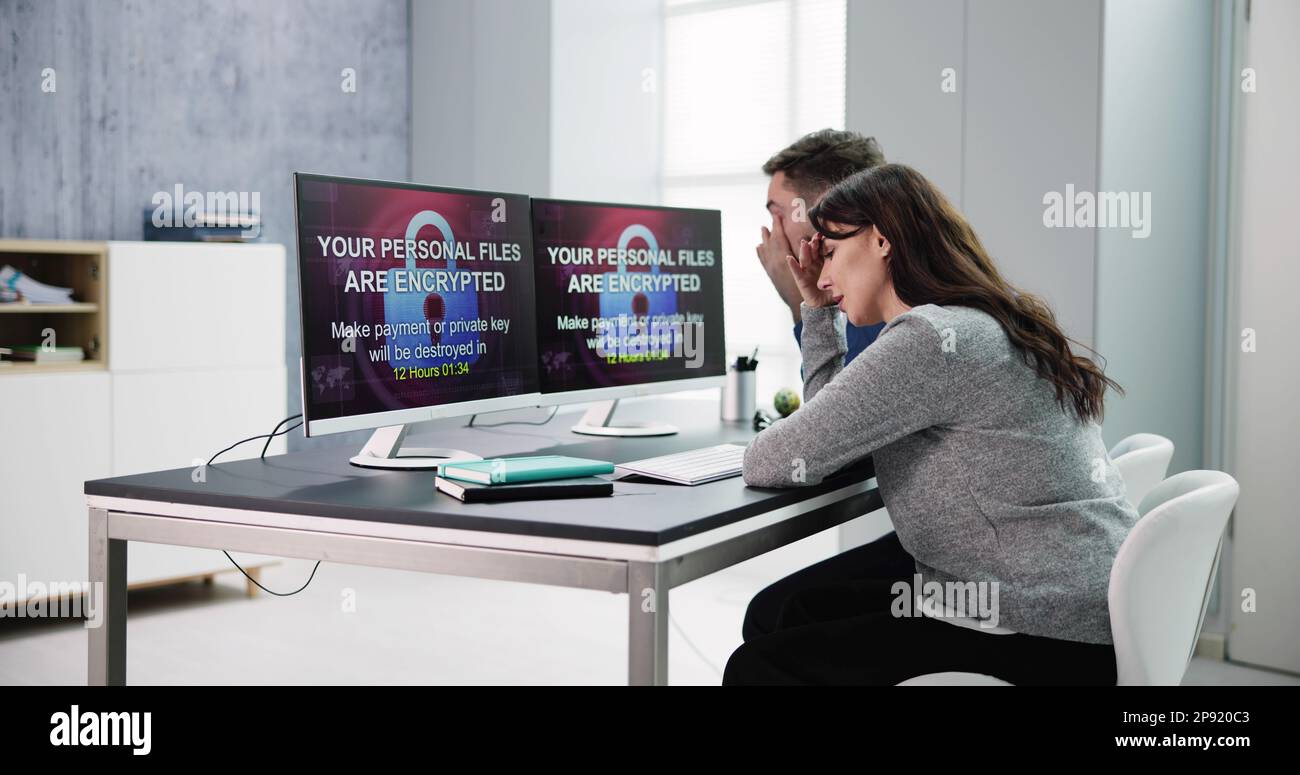 Ransomware Malware Attack And Breach. Business Computer Hacked Stock Photo