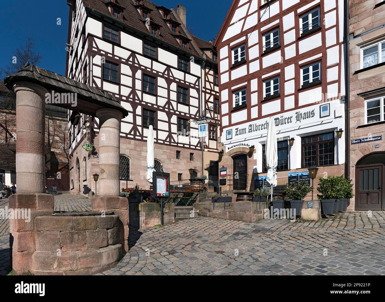 Historic draw well at Tiergaertnertorplatz, Nuremberg, Middle Franconia, Bavaria, Germany Stock Photo