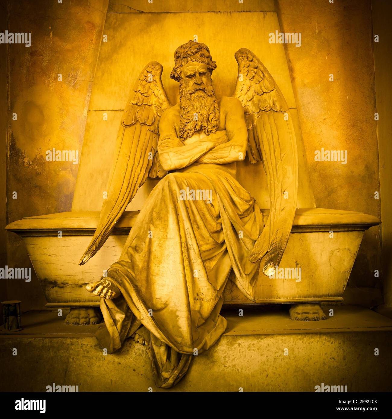 Antique angel statue (monument made in 1820) (marble) in a Christian Catholic cemetery Italy