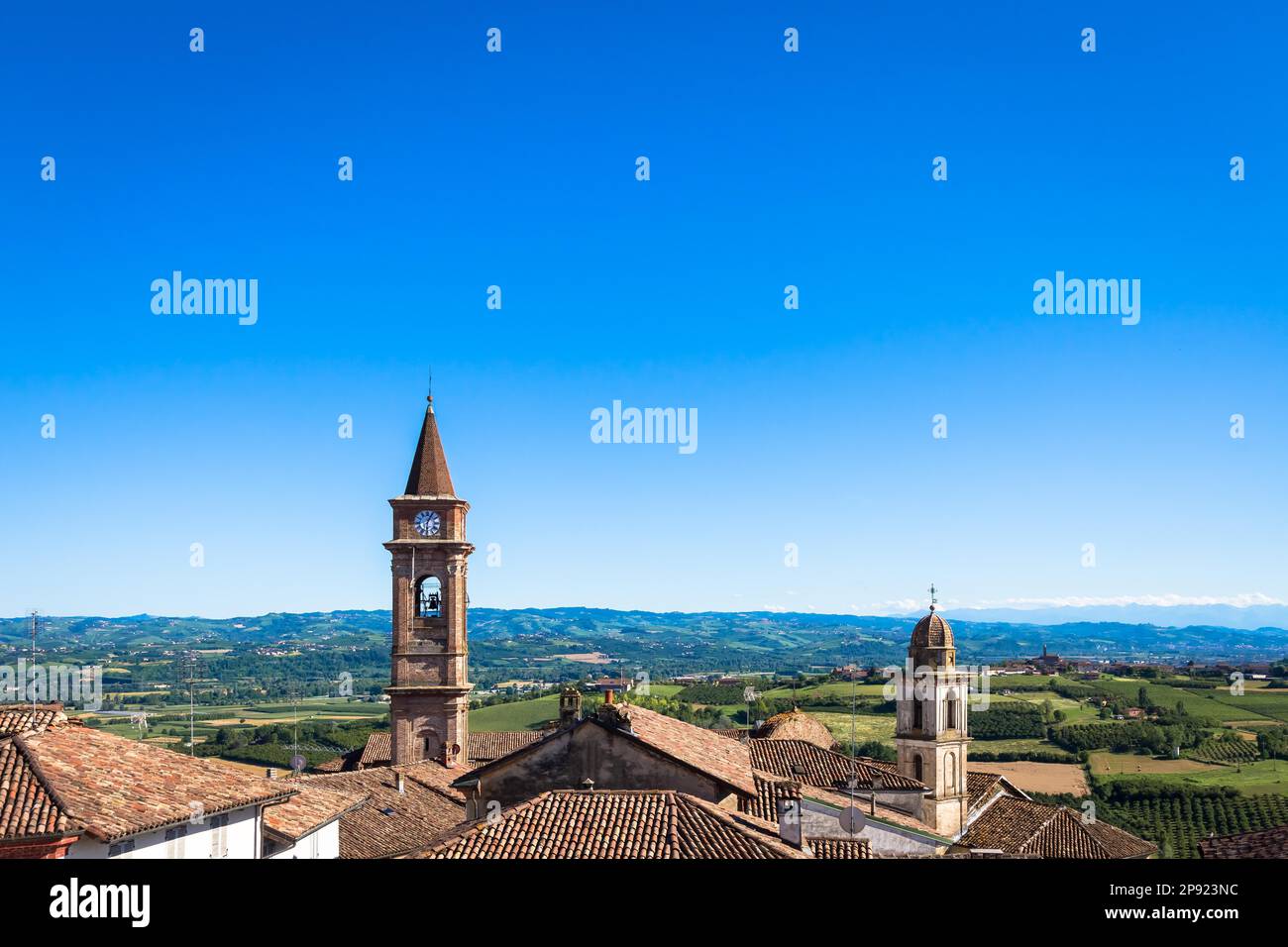 GOVONE, ITALY - CIRCA AUGUST 2020: Piedmont hills in Italy, Monferrato area. Scenic countryside during summer season with vineyard field. Wonderful Stock Photo