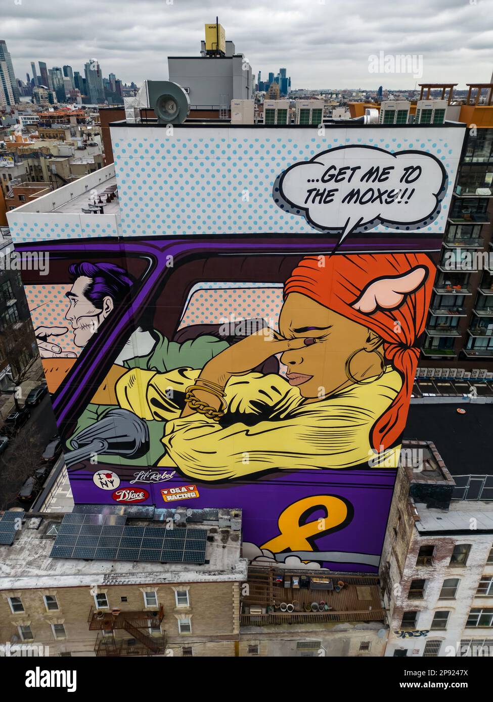 Mural painting by artist DFace on building, text reads 