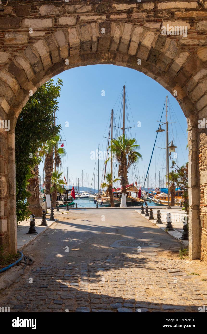 view of Bodrum harbour through stone arch Stock Photo