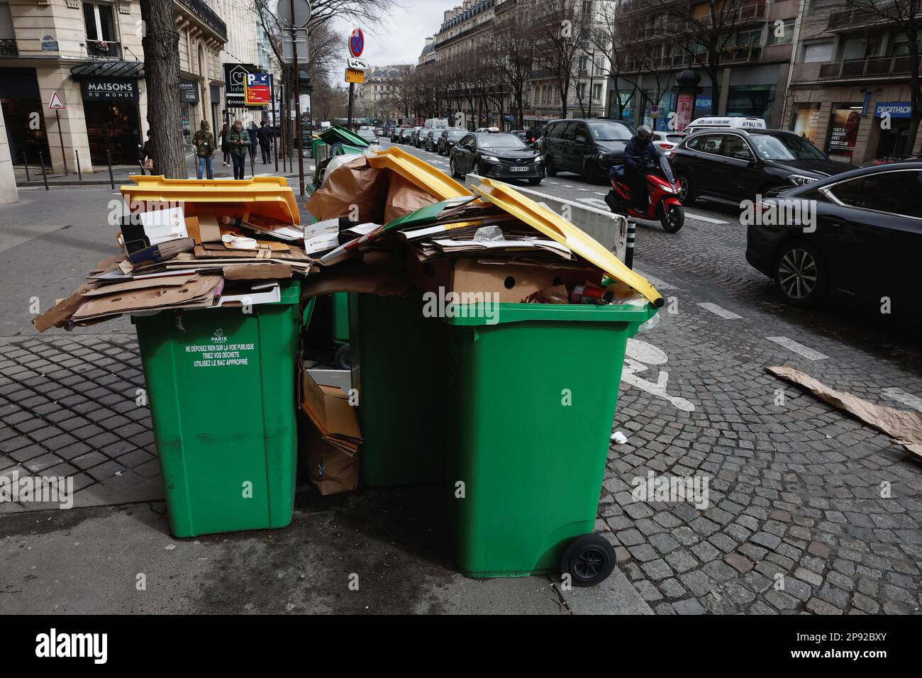 A view of a street where garbage cans are overflowing, as garbage has not been collected, in Paris, France March 10, 2023. REUTERS/Benoit Tessier Stock Photo