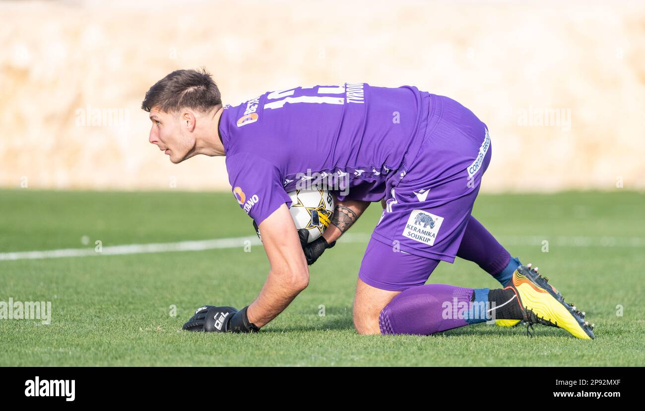 La Nucia, Spain – January 16, 2023. Viktoria Plzen goalkeeper Marian Tvrdon committing a save during club friendly Ferencvaros vs Viktoria Plzen (0-0) Stock Photo