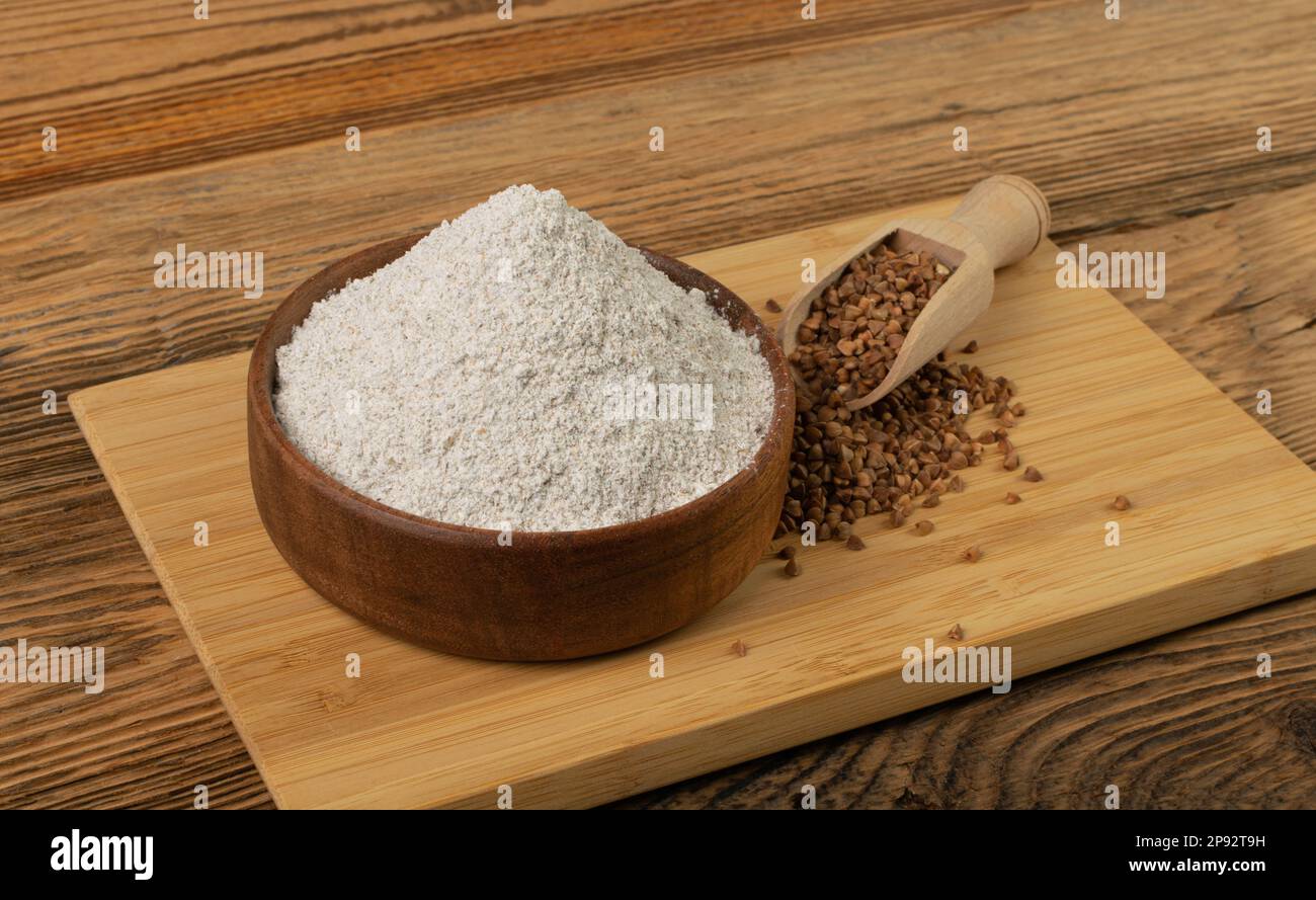 Buckwheat Flour Pile in Wood Bowl, Dry Buck Wheat Powder, Buckwheat