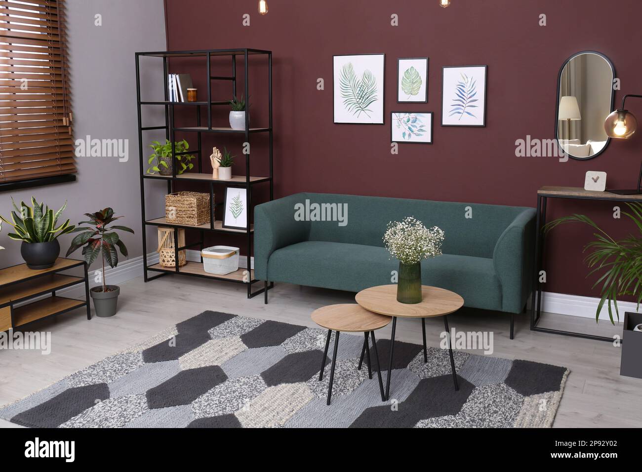 Beautiful living room interior with comfortable sofa Stock Photo - Alamy