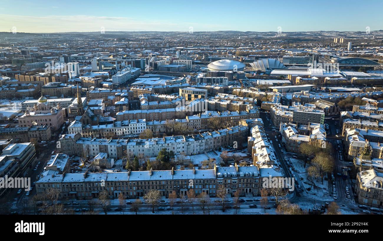 Aerial view of Finneston looking towards Gurdwara Singh Sabha, the OVO Hydro, Science Centre and River Clyde on a snowy spring morning. Stock Photo