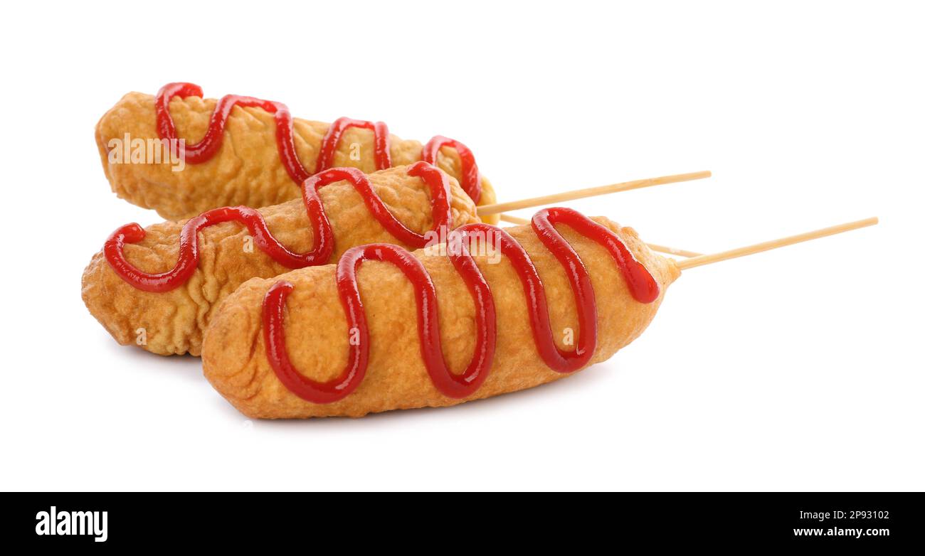 Delicious deep fried corn dogs with ketchup on white background Stock