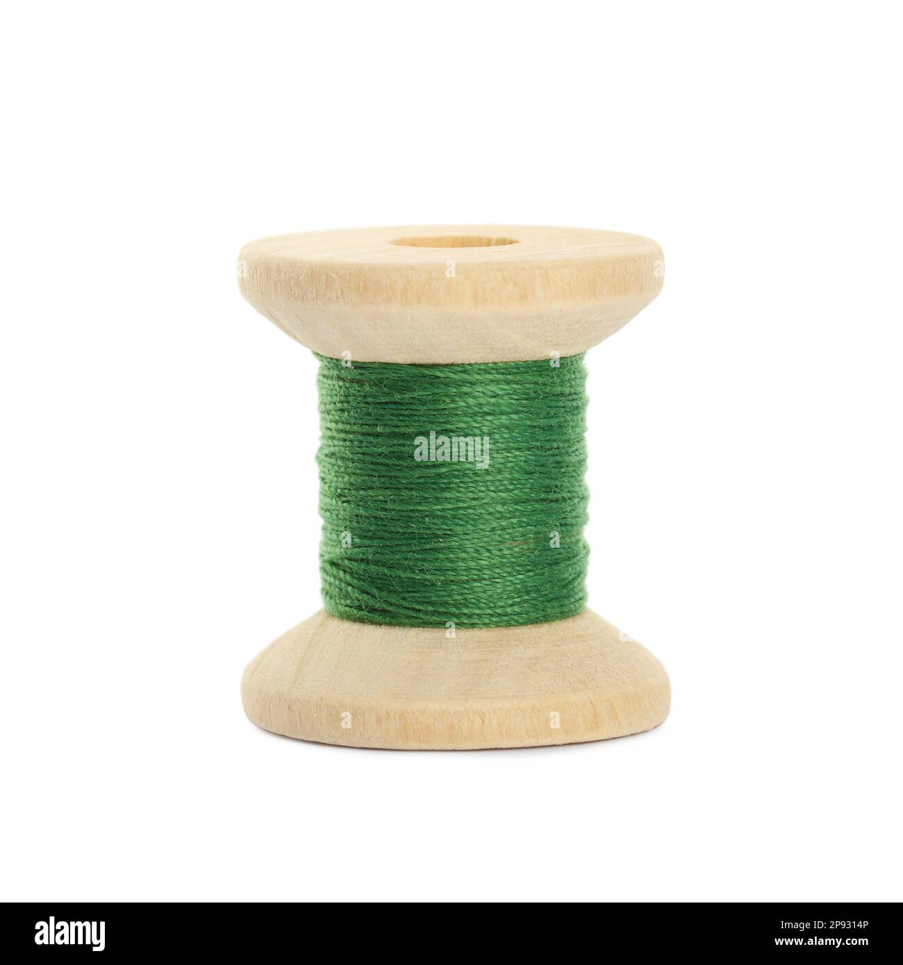 Wooden spool of green sewing thread isolated on white Stock Photo Alamy