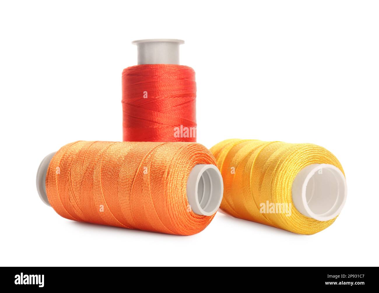 Different colorful sewing threads on white background Stock Photo - Alamy
