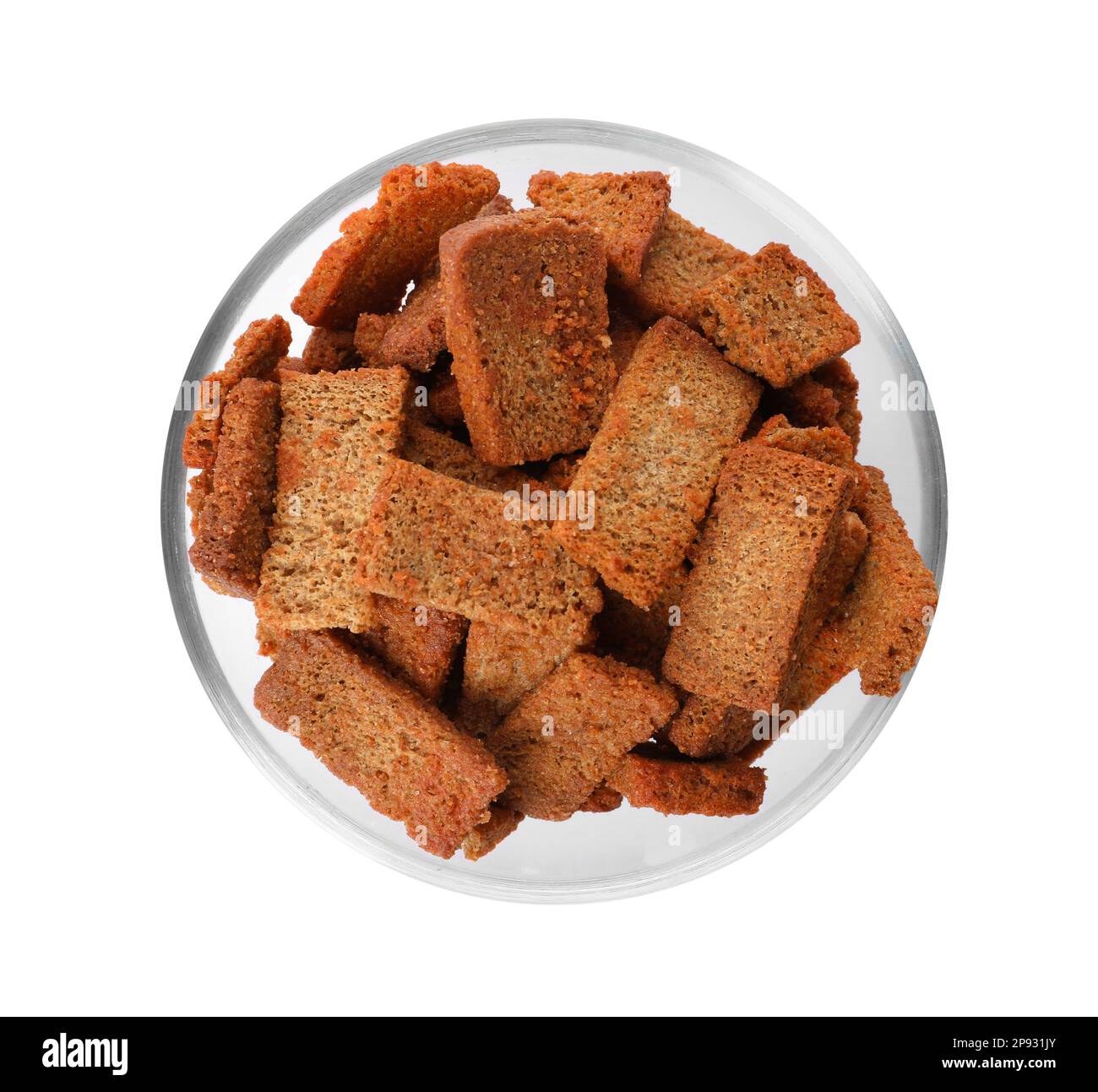 Crispy rusks in bowl isolated on white, top view Stock Photo - Alamy