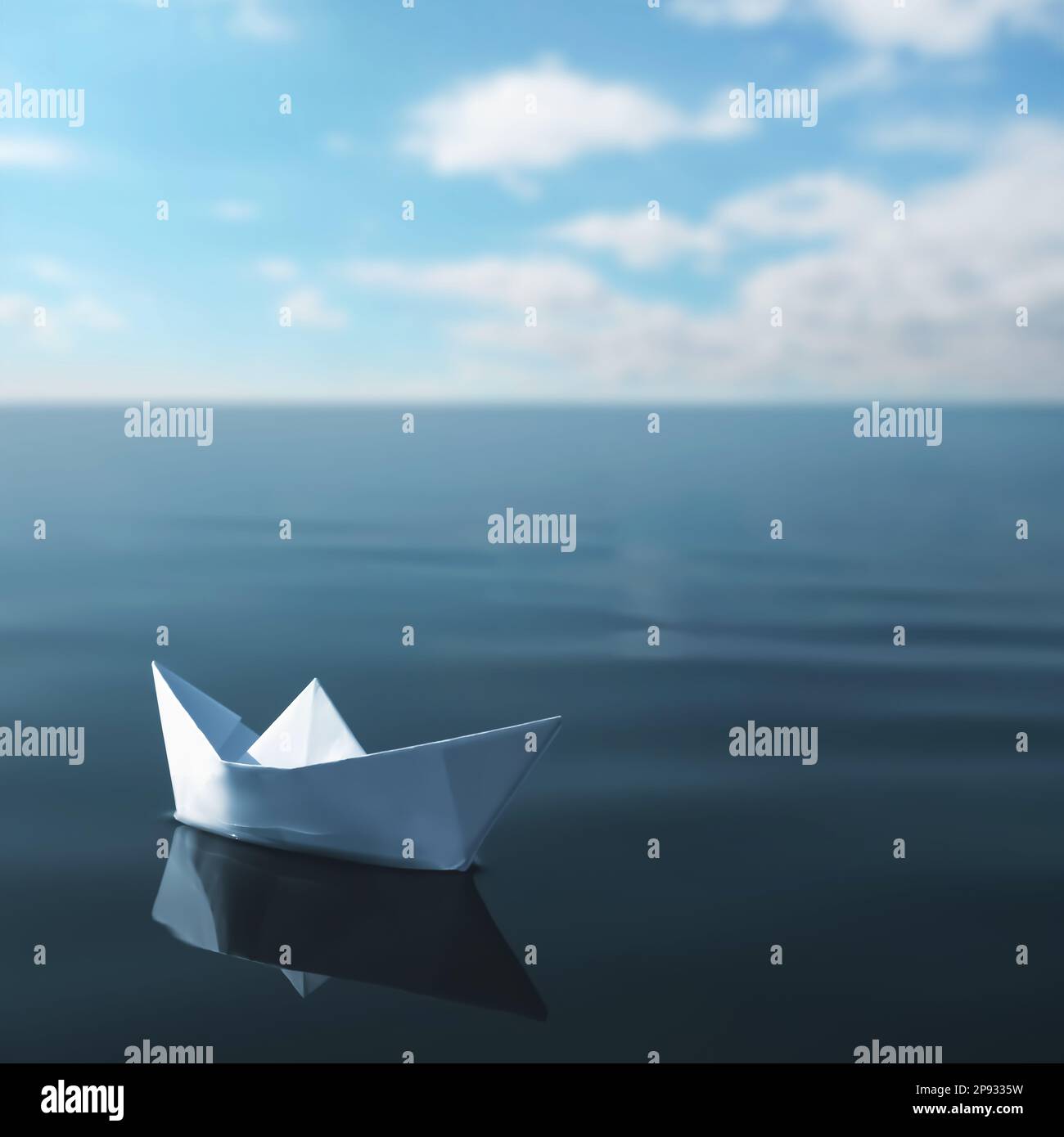 White paper boat floating on calm sea Stock Photo - Alamy