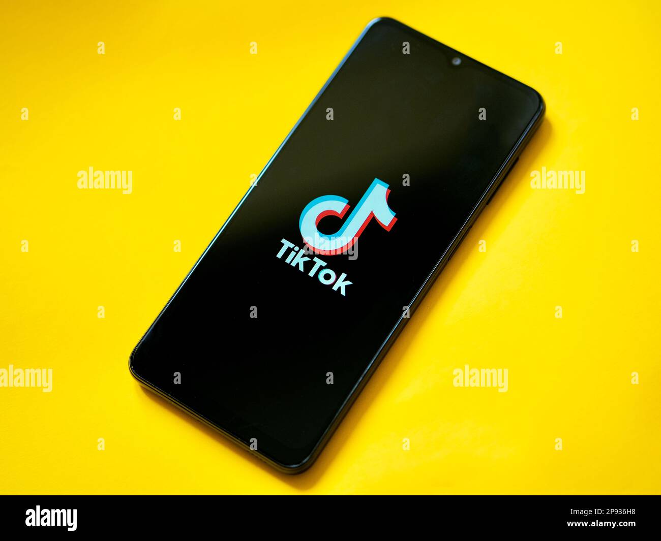 Mobile phone device showing the TikTok logo Stock Photo