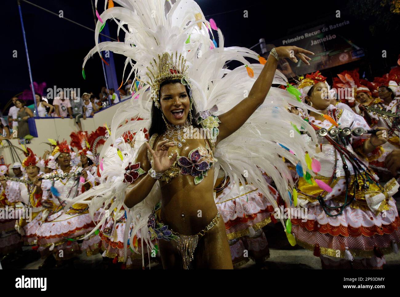 Juliane Almeida, queen of the drums' section of Viradouro samba school dances during carnival parade at the sambodrome, in Rio de Janeiro, Tuesday, Feb. 24, 2009. (AP Photo/Natacha Pisarenko) Stock Photo