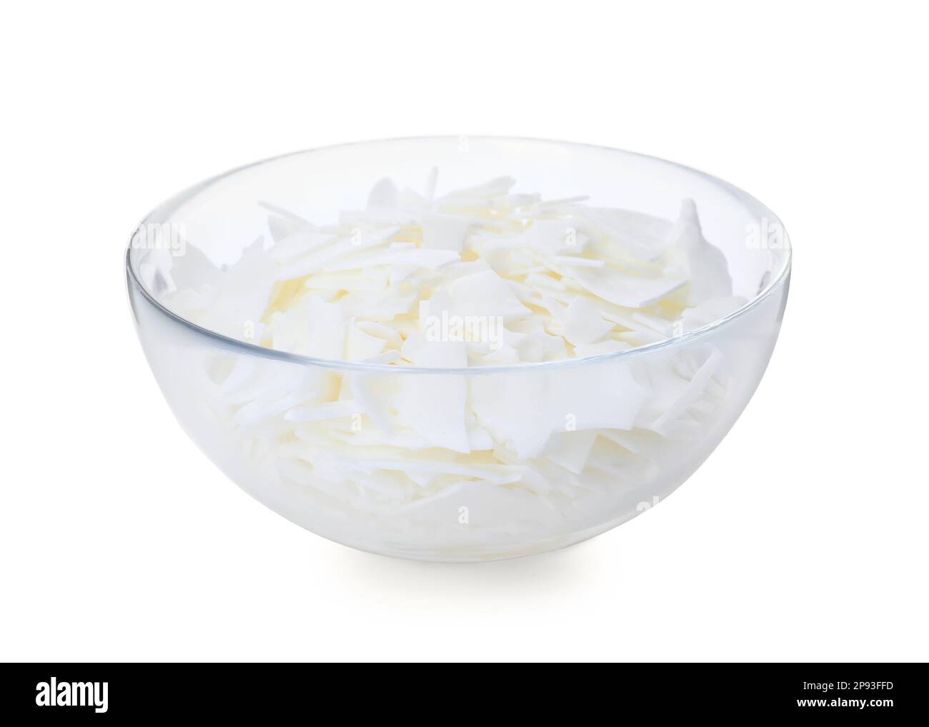 Wooden spoon on heap of soy wax flakes, top view. Homemade candle material  Stock Photo