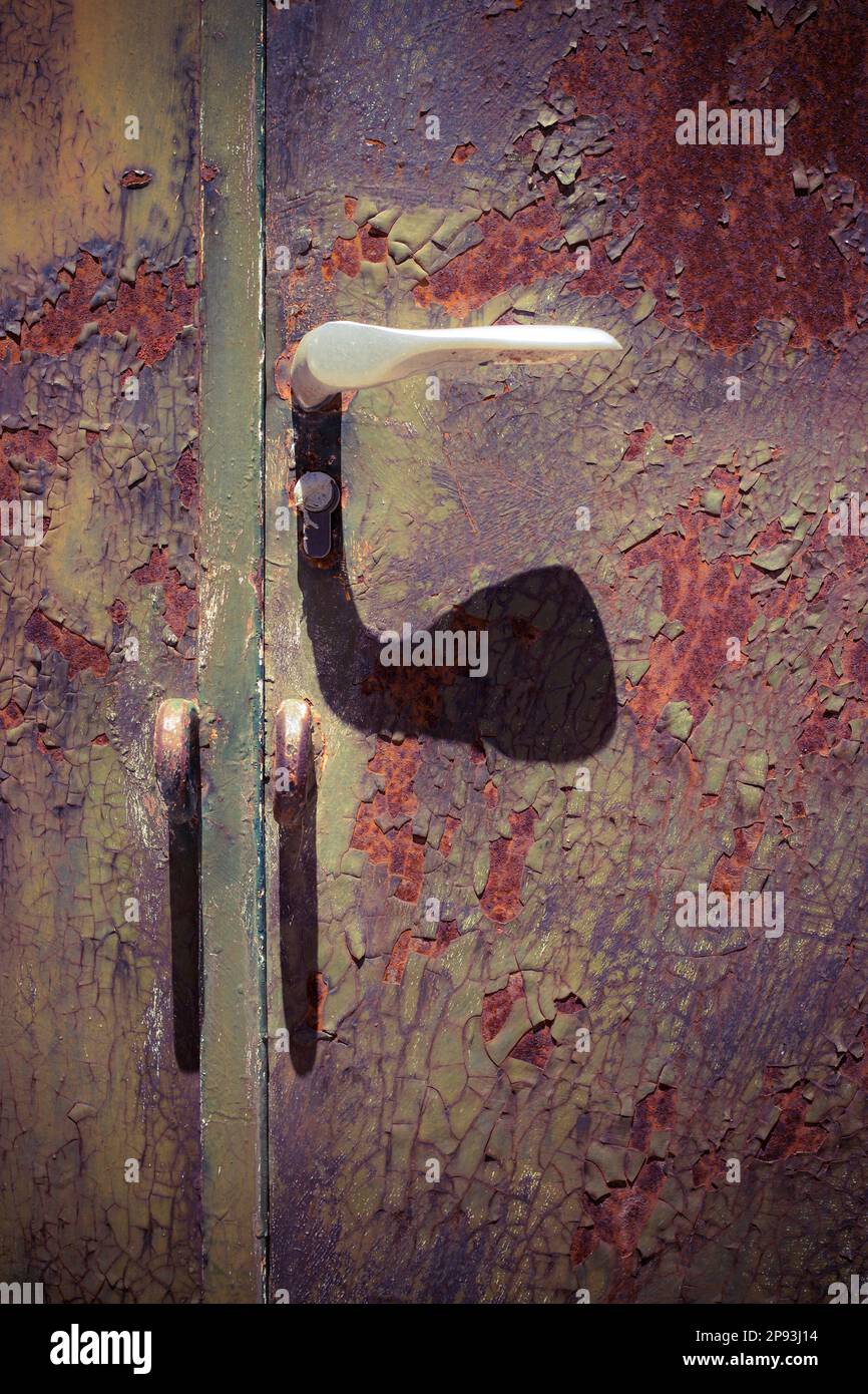Detail of a rusted door with chipped paint Stock Photo Alamy