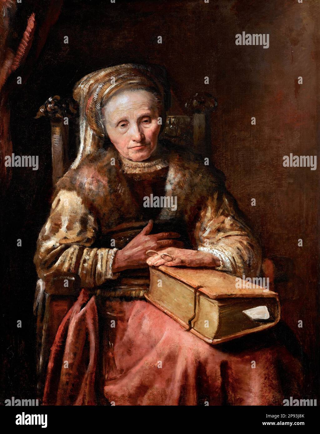 Old Woman with a Book by Carel van der Pluym (1625-1672), oil on canvas, mid 1650s Stock Photo
